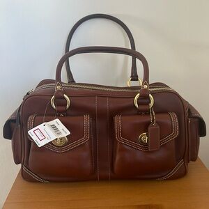Brown leather Coach purse with tags